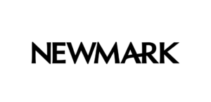 A simple black silhouette of a cat sitting upright.